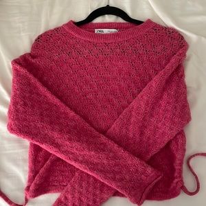 Zara pink sweater with open tie back.